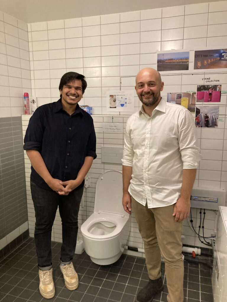 Prithvi Simha (Sanitation360) and Alessio Adamiano (CNR) at the circular sanitation station at SLU